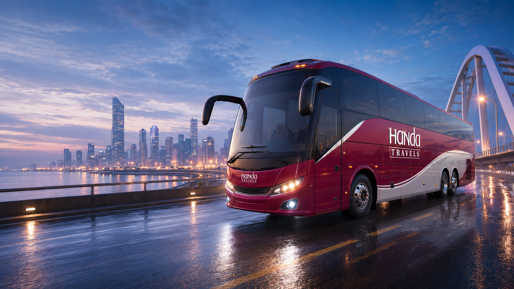 Handa Travels luxury coach on a city bridge at dusk